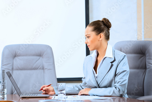Photo: portrait of a successful business woman portrait of a successful business woman