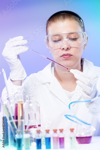Photo: woman scientist in laboratory woman scientist in laboratory