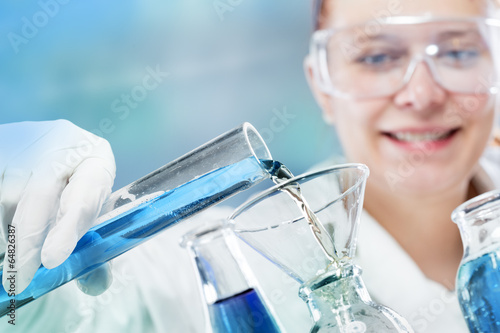 Photo: woman scientist in laboratory woman scientist in laboratory