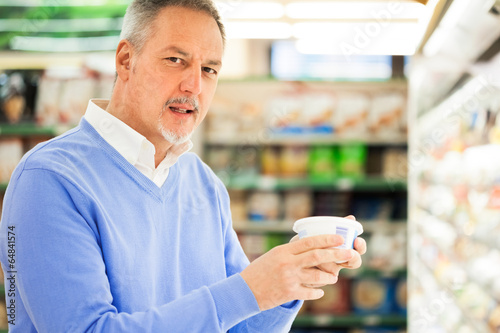 Photo: Man in a supermarket Man in a supermarket