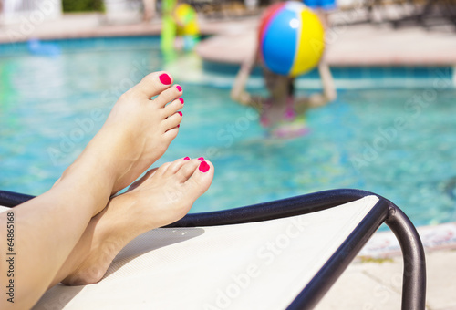 Photo: Beautiful Feet and toes by the swimming pool Beautiful Feet and toes by the swimming pool