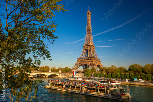Photo: Eiffel Tower with boat on Seine in Paris, France Eiffel Tower with boat on Seine in Paris, France