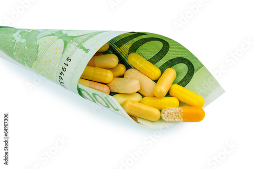 Photo: Tabletten und Einhundert Euroschein Tabletten und Einhundert Euroschein