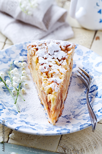 Photo: Piece of an Apple Cake Dusted with Icing Sugar Piece of an Apple Cake Dusted with Icing Sugar