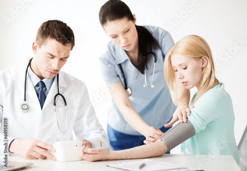 Photo: doctor and patient in hospital doctor and patient in hospital