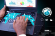 Business man showing financial report in laptop Business man showing financial report in laptop