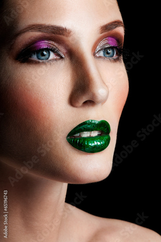 Photo: Portrait of beautiful woman model with professional makeup Portrait of beautiful woman model with professional makeup