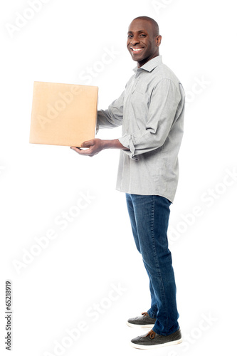 Photo: Smiling middle aged delivery man Smiling middle aged delivery man