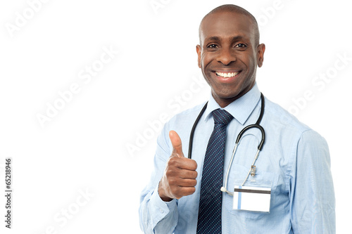 Photo: Smiling medical doctor showing thumbs up Smiling medical doctor showing thumbs up
