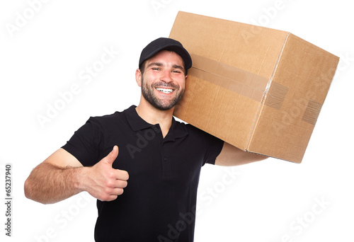 Photo: Smiling delivery man giving cardbox Smiling delivery man giving cardbox