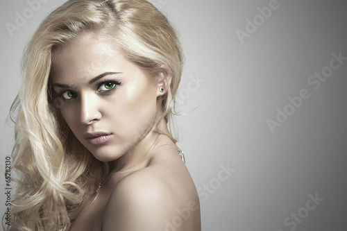 Photo: Fashion portrait of young beautiful woman.Sexy Blond girl Fashion portrait of young beautiful woman.Sexy Blond girl