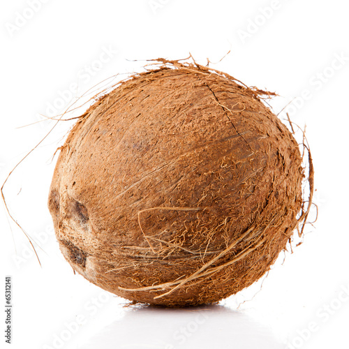 Photo: Coconut isolated on white. Coconut isolated on white.