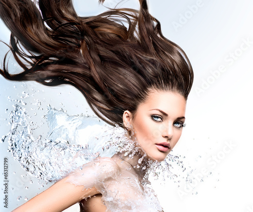 Fototapeta Model girl with water splash collar and long blowing hair