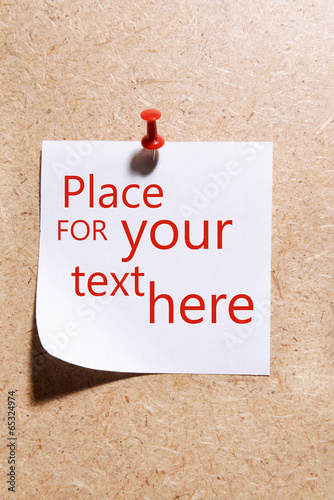 Photo: Paper sheet on wooden background Paper sheet on wooden background