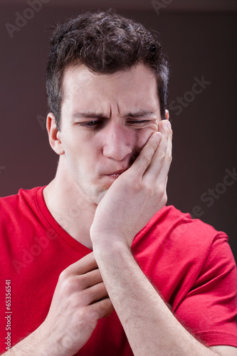 Photo: Man with a toothache Man with a toothache