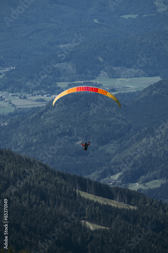 Photo: Paraglider over Austrian Alps with Karawanken Range Paraglider over Austrian Alps with Karawanken Range
