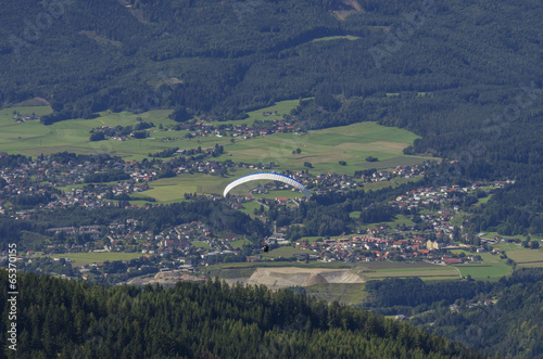 Photo: Paraglider over Austrian Alps with Karawanken Range Paraglider over Austrian Alps with Karawanken Range