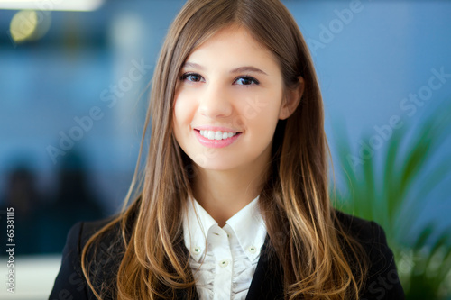 Photo: Smiling businesswoman portrait Smiling businesswoman portrait