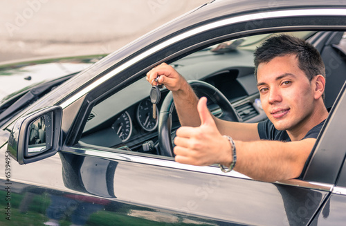 Photo: happy man in his car happy man in his car