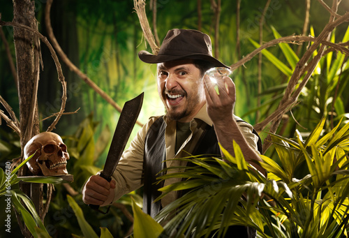 Photo: Explorer finding a treasure Explorer finding a treasure