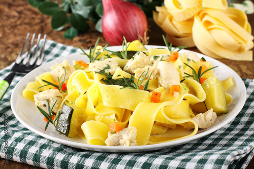 Photo: Pasta with fish, zucchini and carrots Pasta with fish, zucchini and carrots