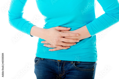 Photo: Woman with stomach issues Woman with stomach issues