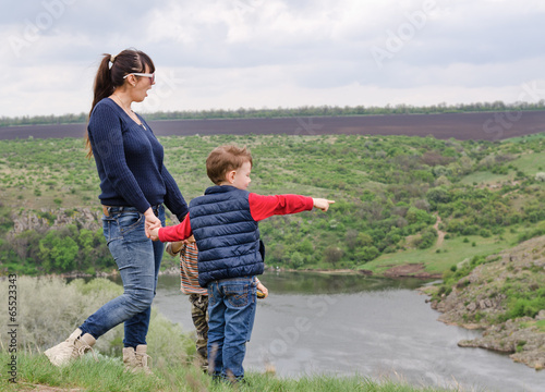 Photo: Little boy pointing to something in the country Little boy pointing to something in the country