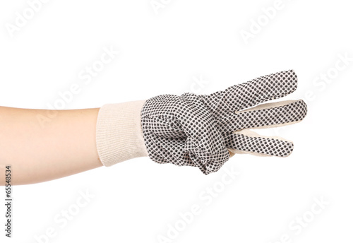 Photo: Hand in gloves shows three. Hand in gloves shows three.