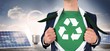Composite image of businessman opening shirt in superhero style Composite image of businessman opening shirt in superhero style