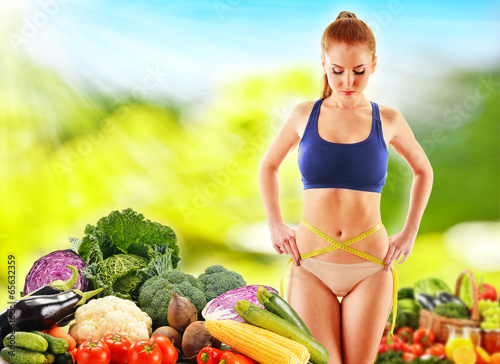 Photo: Dieting. Balanced diet based on raw organic vegetables Dieting. Balanced diet based on raw organic vegetables