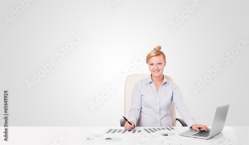Photo: Young businesswoman with plain white copy space Young businesswoman with plain white copy space