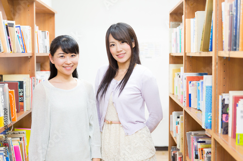 Photo: young asian women in the library young asian women in the library