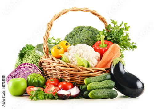 Photo: Variety of fresh organic vegetables isolated on white Variety of fresh organic vegetables isolated on white