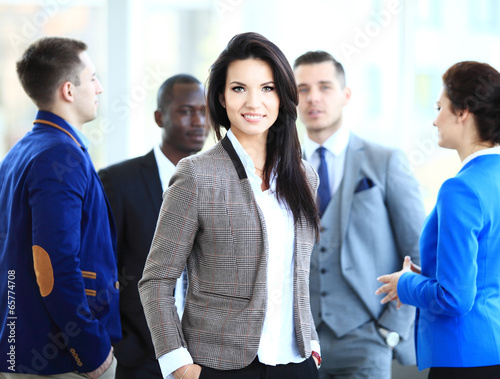 Photo: Business lady with positive look and cheerful smile Business lady with positive look and cheerful smile