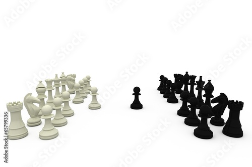 Photo: Black and white pawns making move Black and white pawns making move