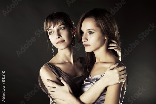 Photo: Two young happy fashion women Two young happy fashion women