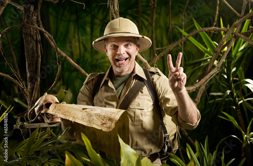Photo: Successful adventurer in the jungle Successful adventurer in the jungle