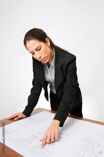Photo: Business dressed female model,in different role plays Business dressed female model,in different role plays