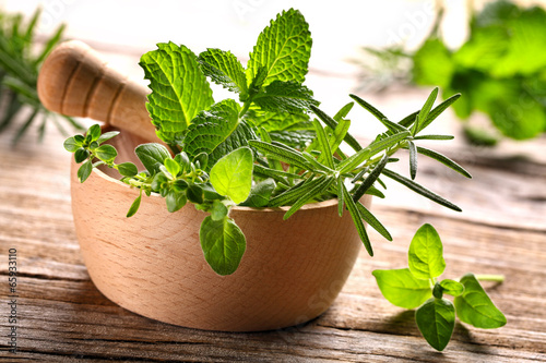 Photo: herbs in mortar herbs in mortar