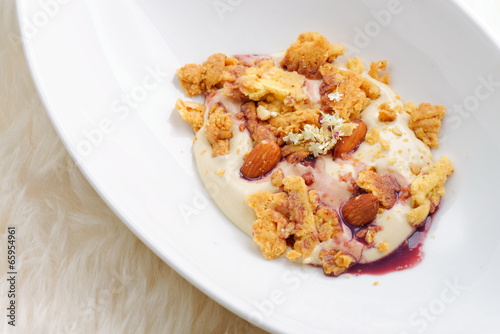 Photo: Modern style zabaglione Italian dessert with almonds Modern style zabaglione Italian dessert with almonds