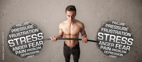 Photo: muscular man fighting with stress muscular man fighting with stress