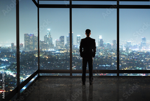 Photo: businessman in office businessman in office