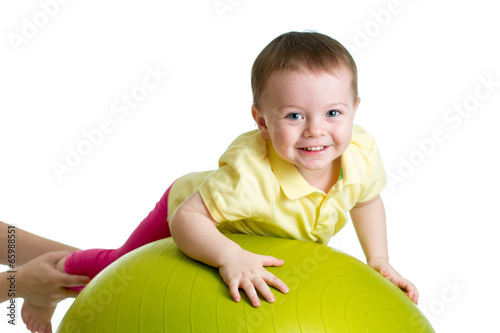 Photo: kid on gymnastic ball kid on gymnastic ball