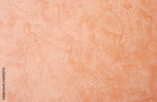 Photo: Cement wall background, orange colored. Cement wall background, orange colored.