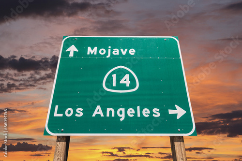 Photo: Mojave Desert Freeway Sign to Los Angeles with Sunset Sky Mojave Desert Freeway Sign to Los Angeles with Sunset Sky
