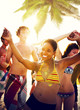 Young People Enjoying a Summer Beach Party Young People Enjoying a Summer Beach Party