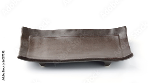 Photo: Ceramic plate isolated on a white background Ceramic plate isolated on a white background