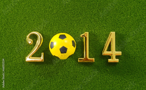 Photo: 2014 message make of metal numbers and football soccer ball on g 2014 message make of metal numbers and football soccer ball on g