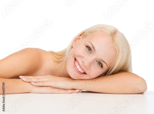Photo: clean face and shoulders of beautiful young woman clean face and shoulders of beautiful young woman