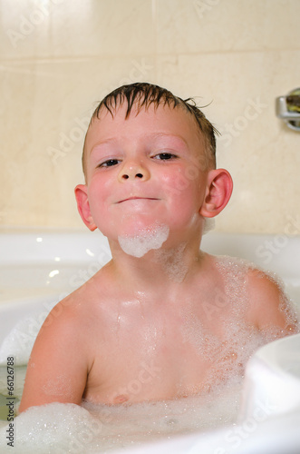 Photo: Young boy bathing in the tub Young boy bathing in the tub